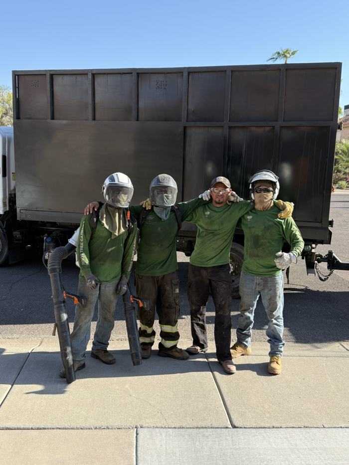 The crew in front of their chip truck